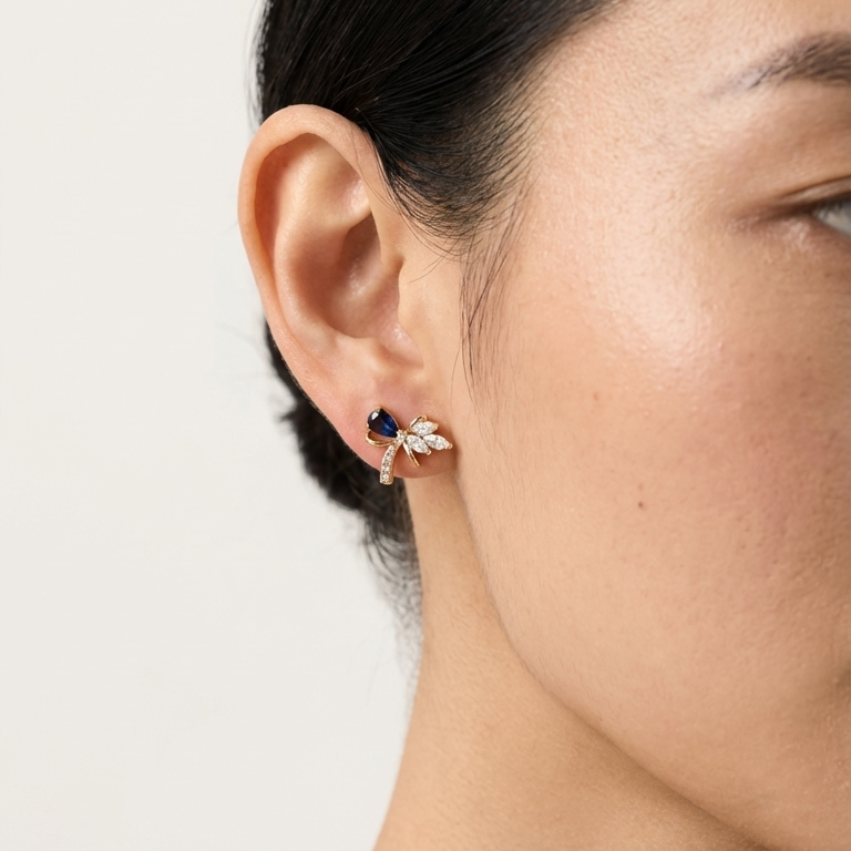 ROSIVAA Blue Sapphire Bow Studs