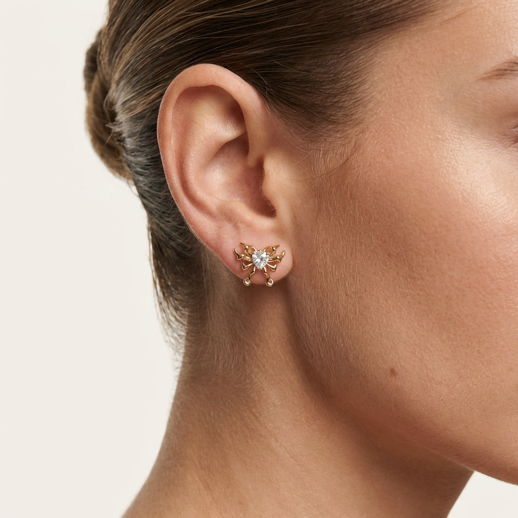 ROSIVAA Gold Heart Winged Butterfly Studs