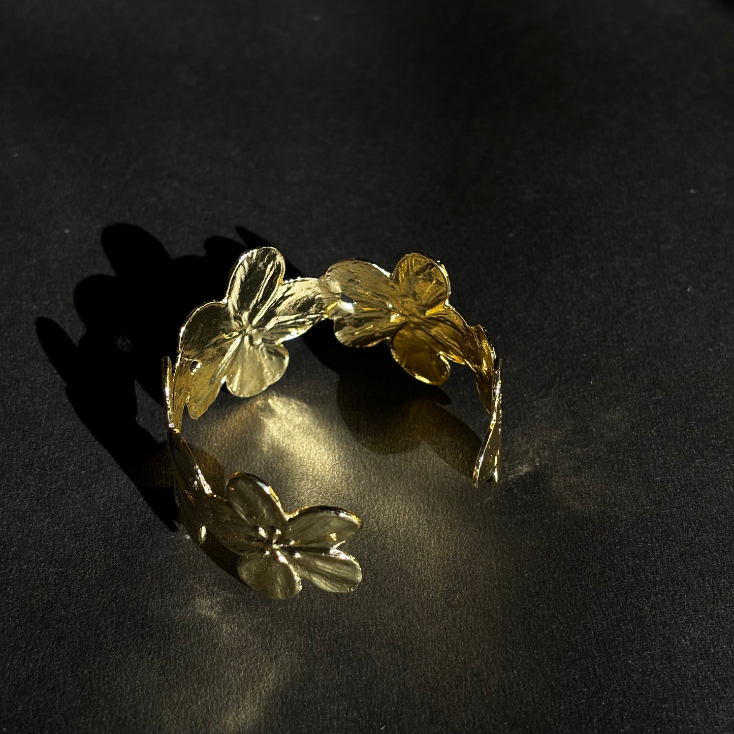 ROSIVAA Gold Textured Floral Cuff Bracelet